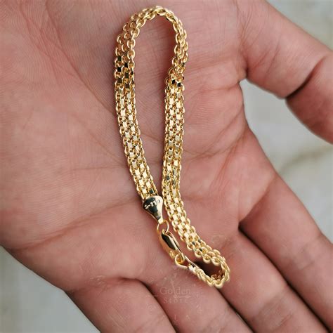 Pulseras de tejido y oro para hombre 